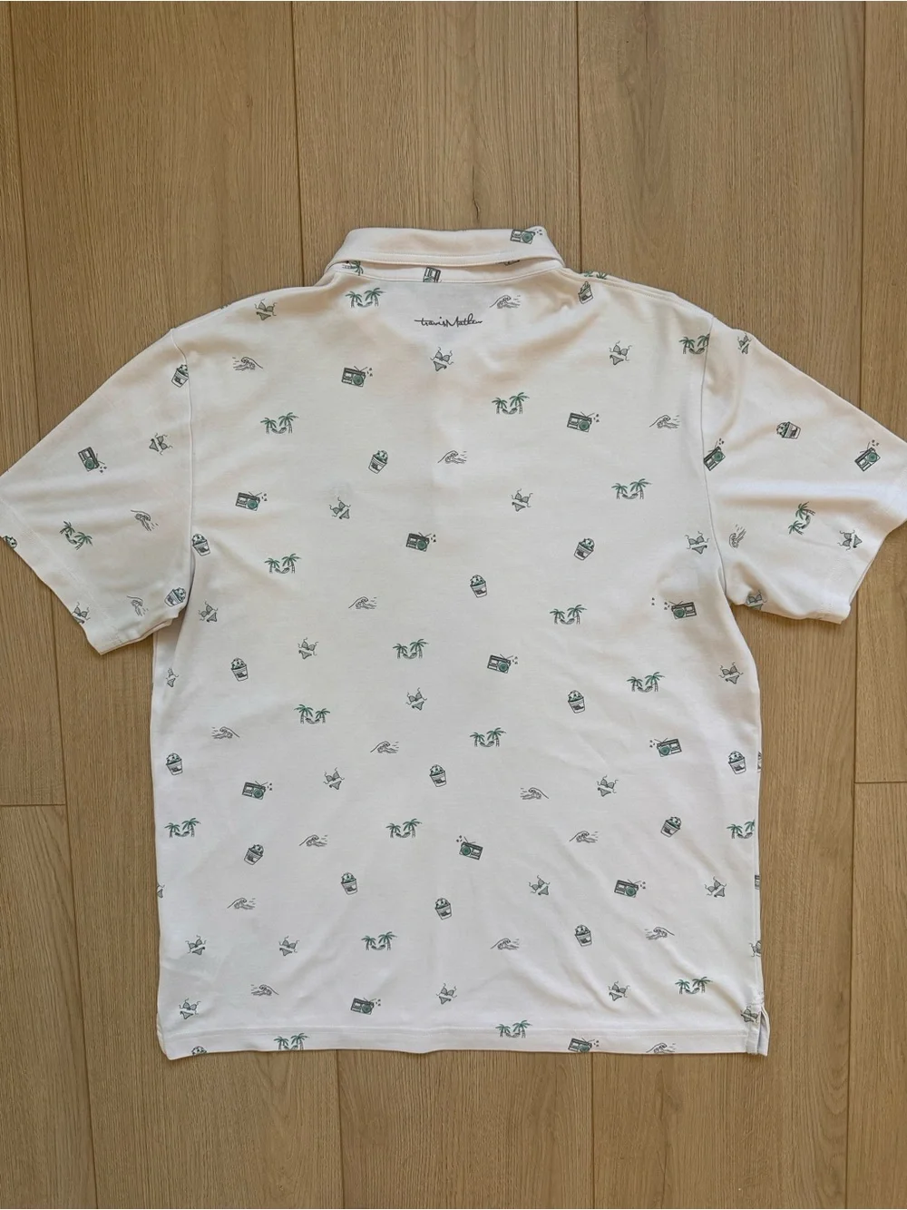 Travis Mathew White Polo with Palm & Beach Icons